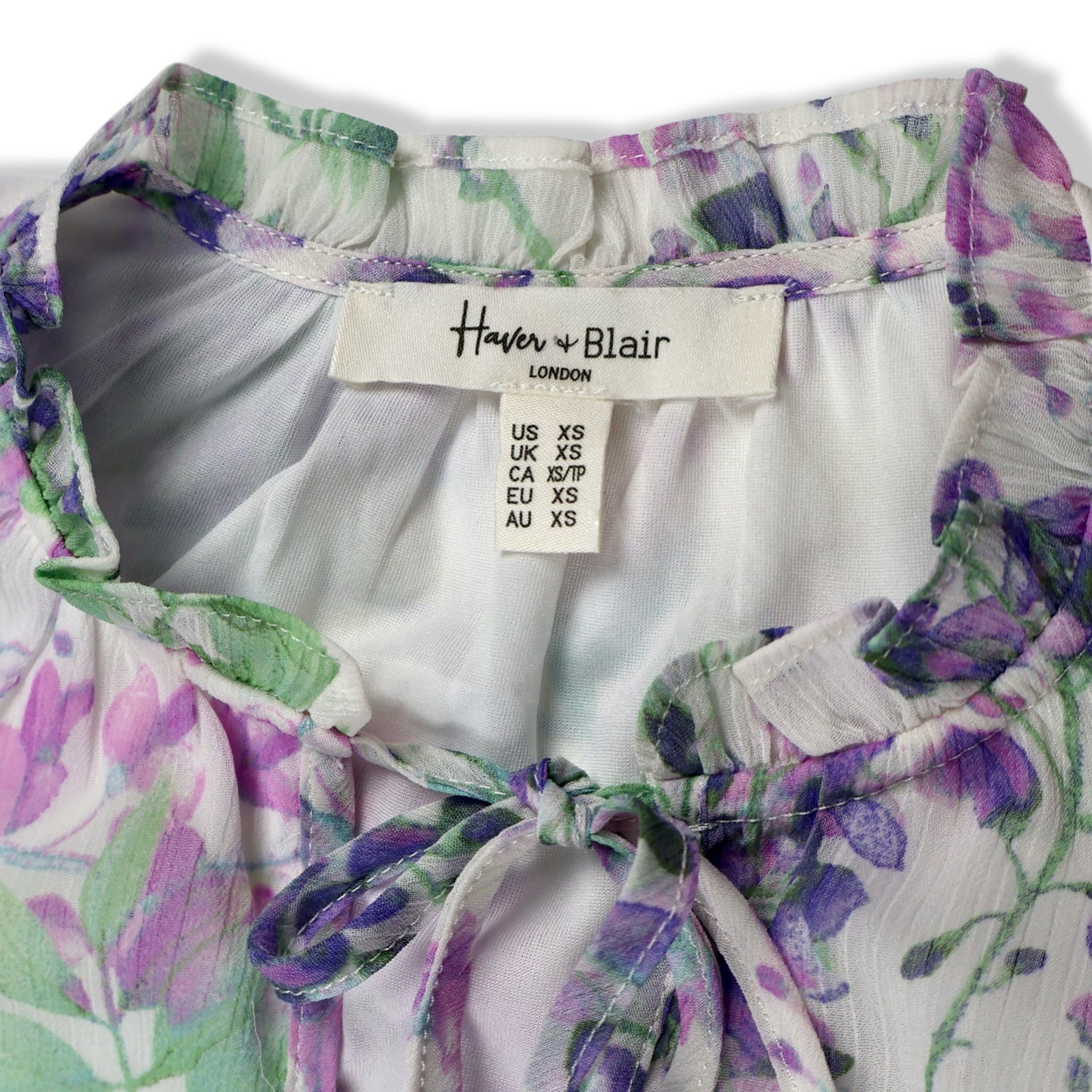 BLUSA CON ESTAMPADO FLORAL LILA CON LAZO EN EL CUELLO | HAVEN + BLAIR | TALLA XS