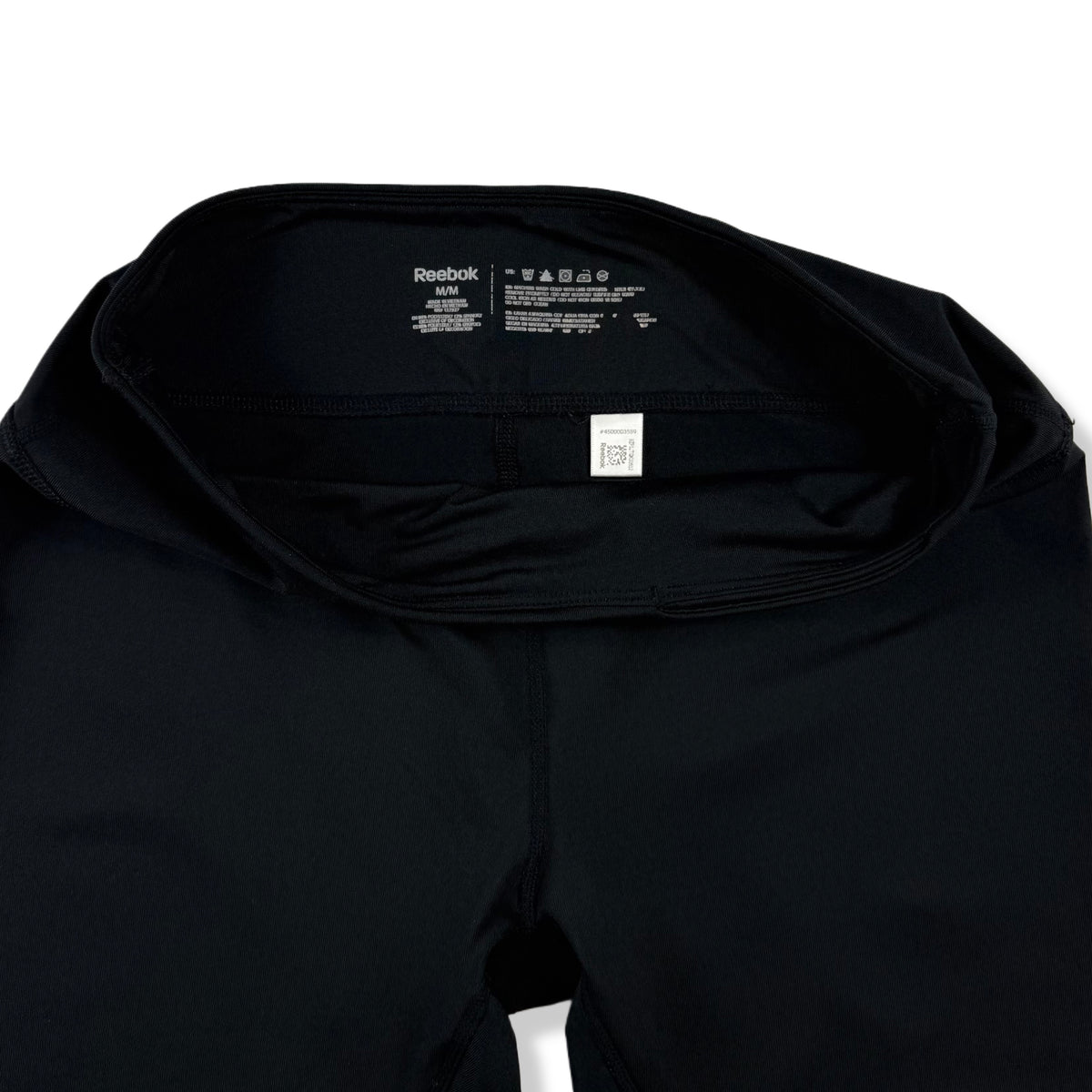 LEGGINGS DEPORTIVOS NEGROS 3/4 CON LOGO LATERAL | REEBOK | TALLA M