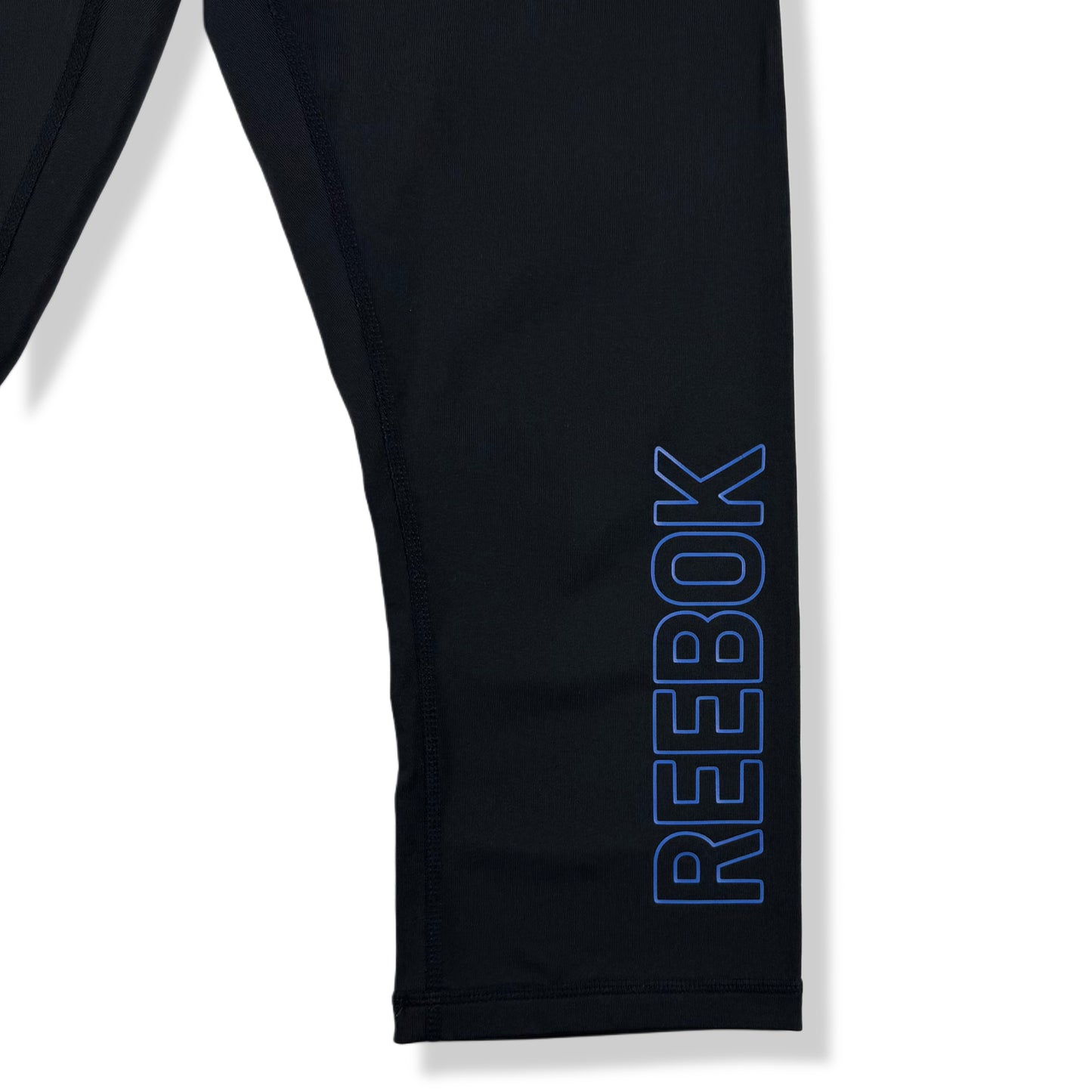 LEGGINGS DEPORTIVOS NEGROS 3/4 CON LOGO LATERAL | REEBOK | TALLA M