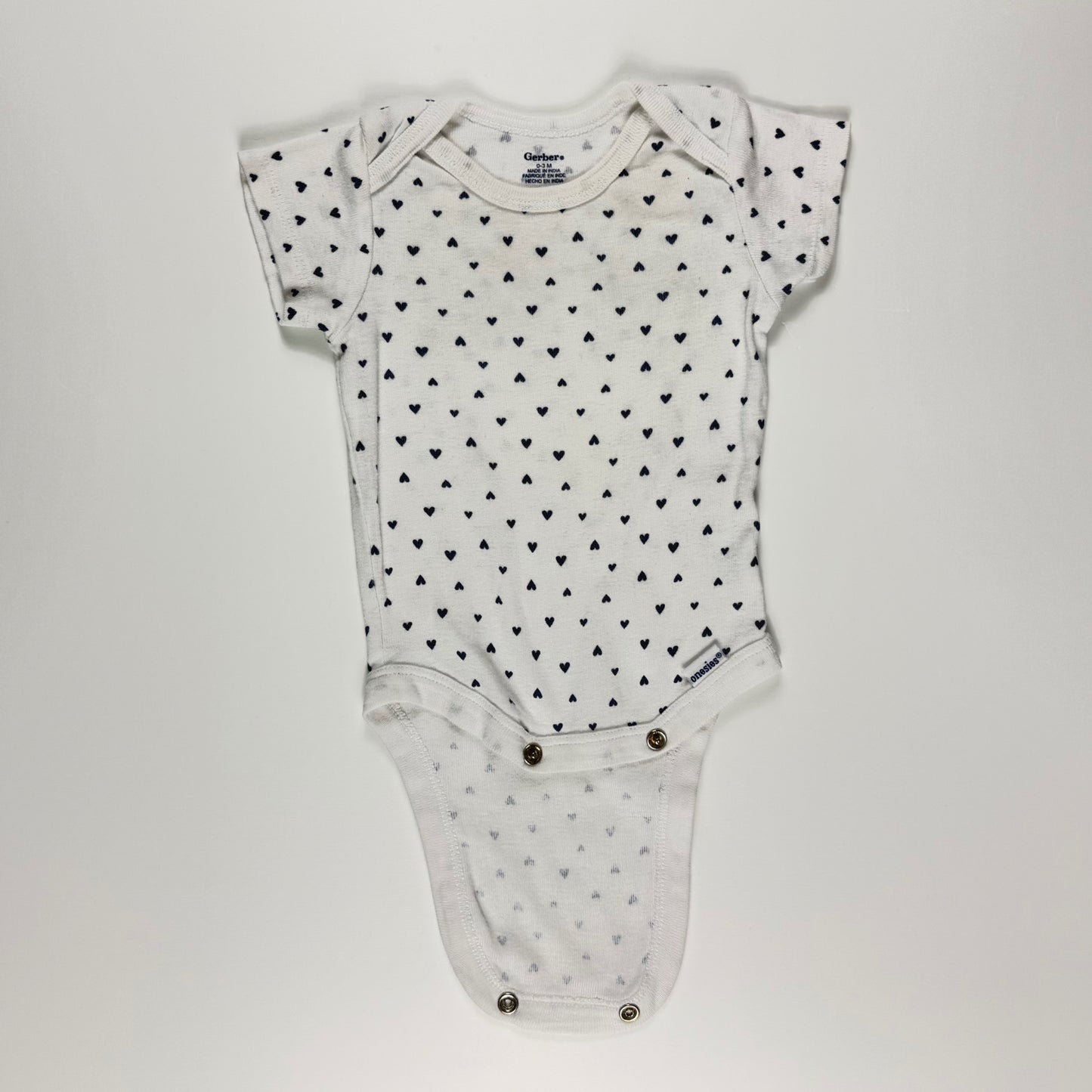 ENTERIZO CON ESTAMPADO DE CORAZONES | GERBER | TALLA 0–3 MESES
