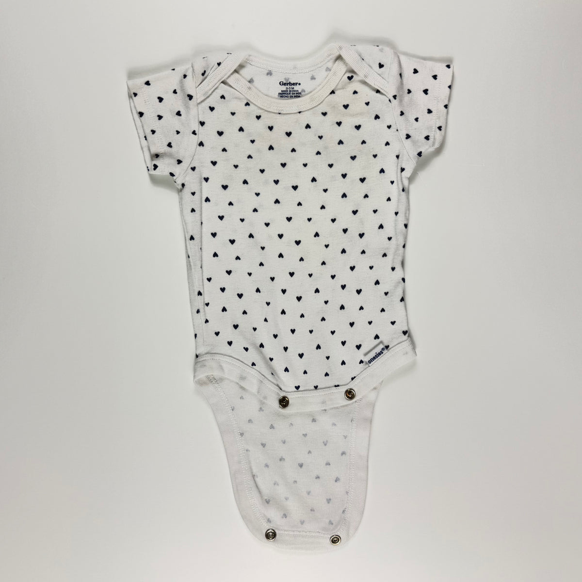 ENTERIZO CON ESTAMPADO DE CORAZONES | GERBER | TALLA 0–3 MESES