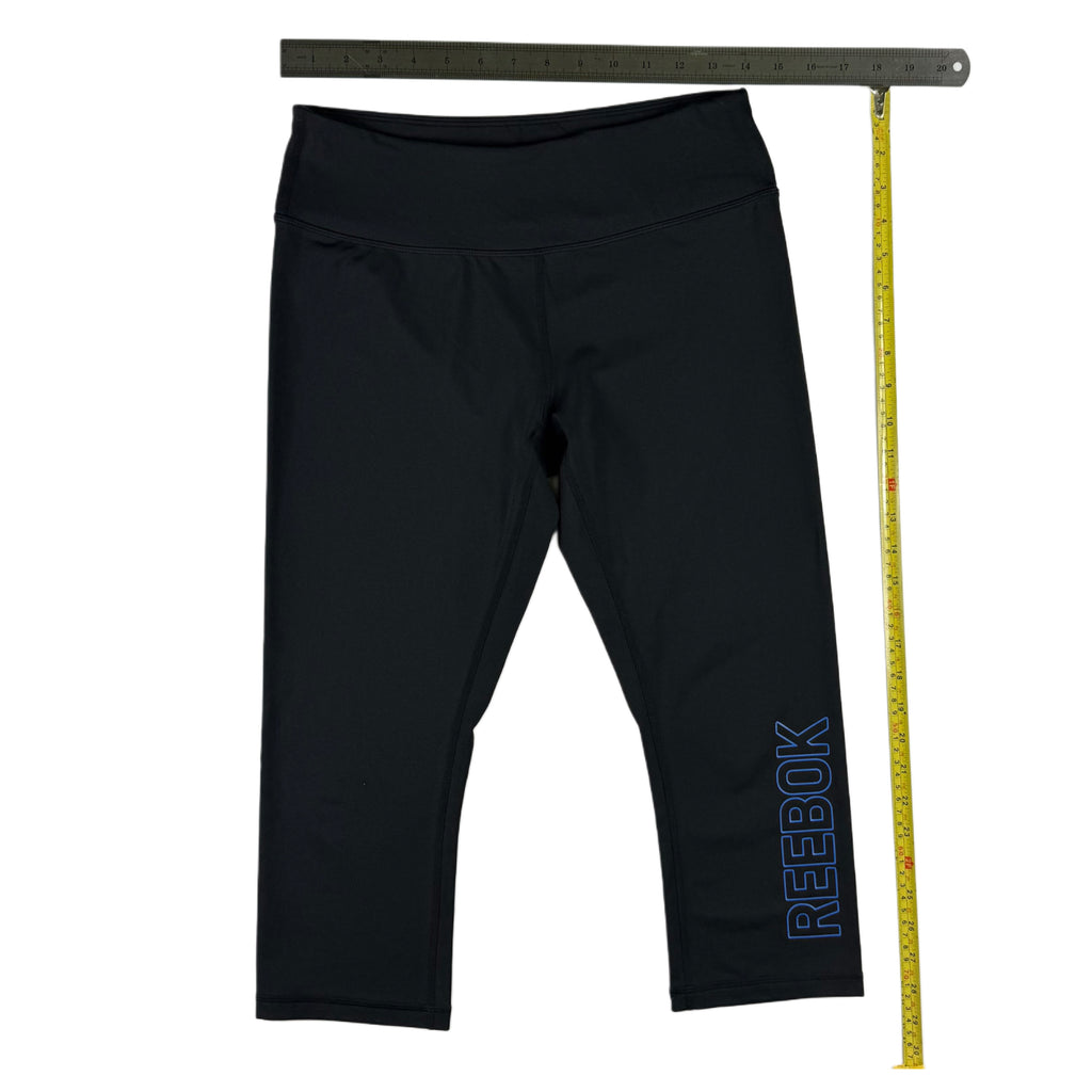 LEGGINGS DEPORTIVOS NEGROS 3/4 CON LOGO LATERAL | REEBOK | TALLA M
