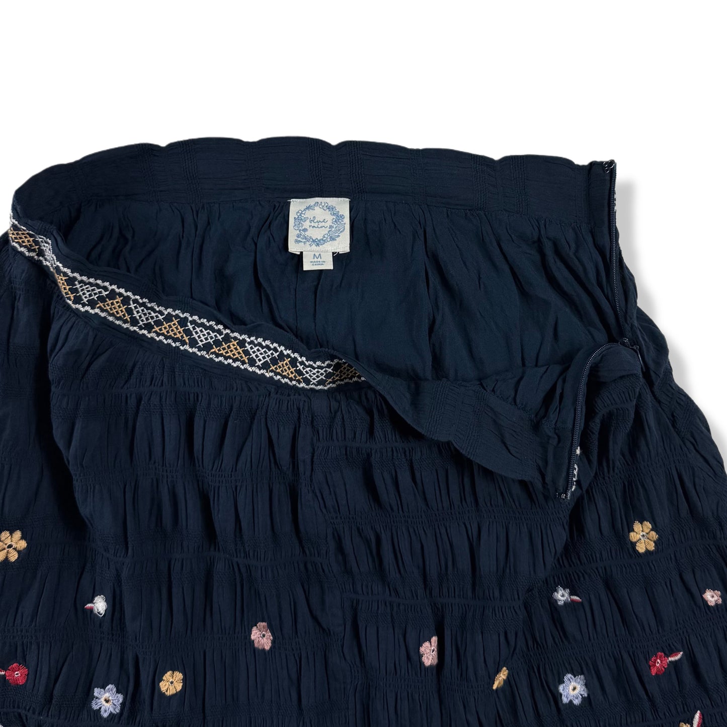 FALDA AZUL MARINO CON BORDADO FLORALES | BLUE RAIN | TALLA M