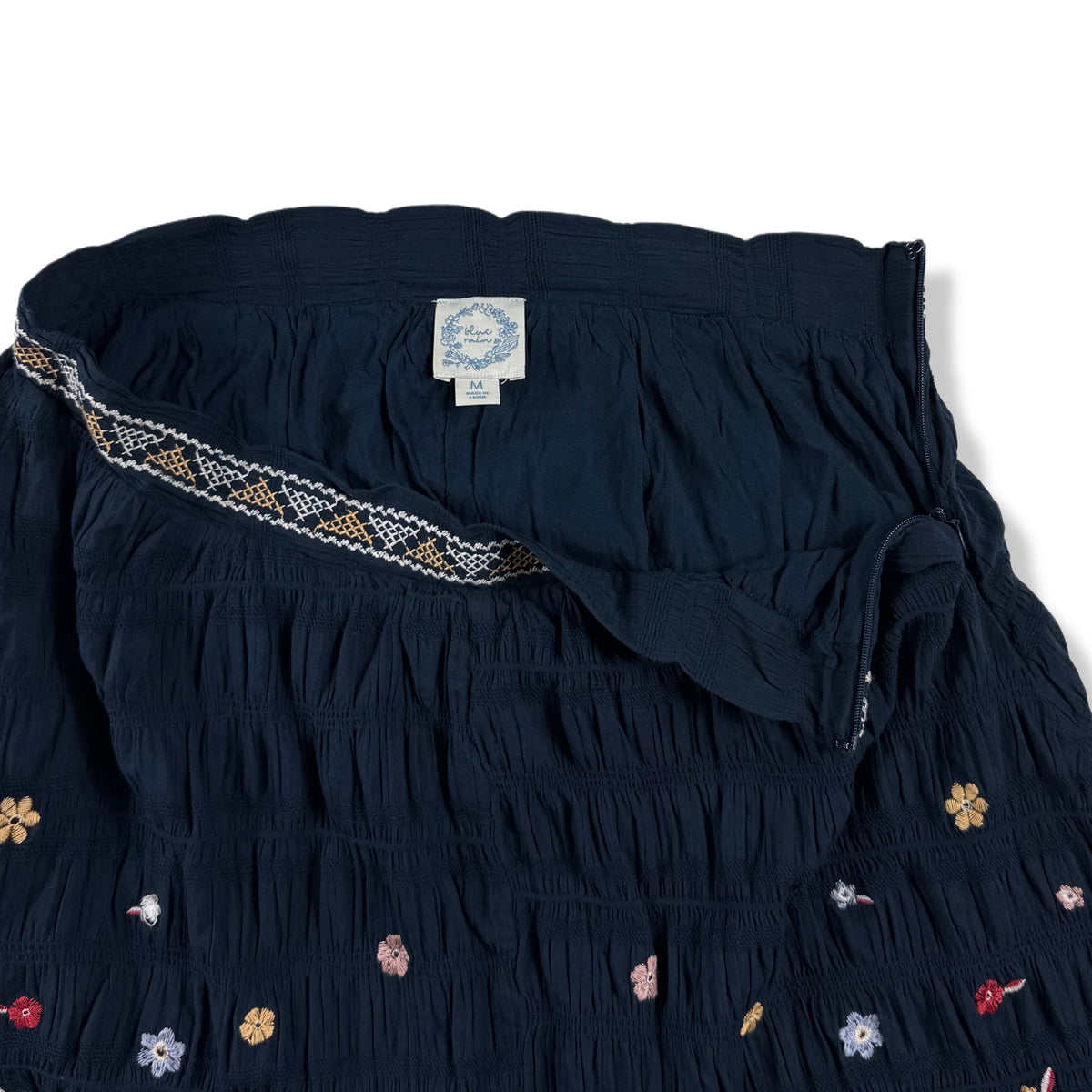 FALDA AZUL MARINO CON BORDADO FLORALES | BLUE RAIN | TALLA M