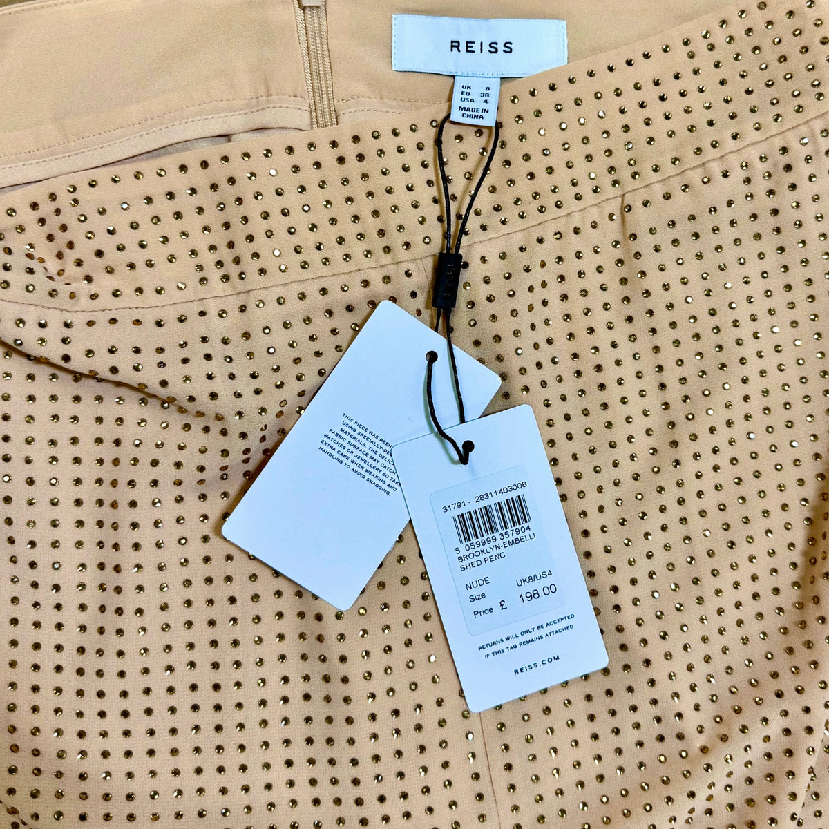 FALDA MIDI DE TIRO ALTO CON ADORNOS Y ABERTURA DELANTERA | REISS | TALLA 4