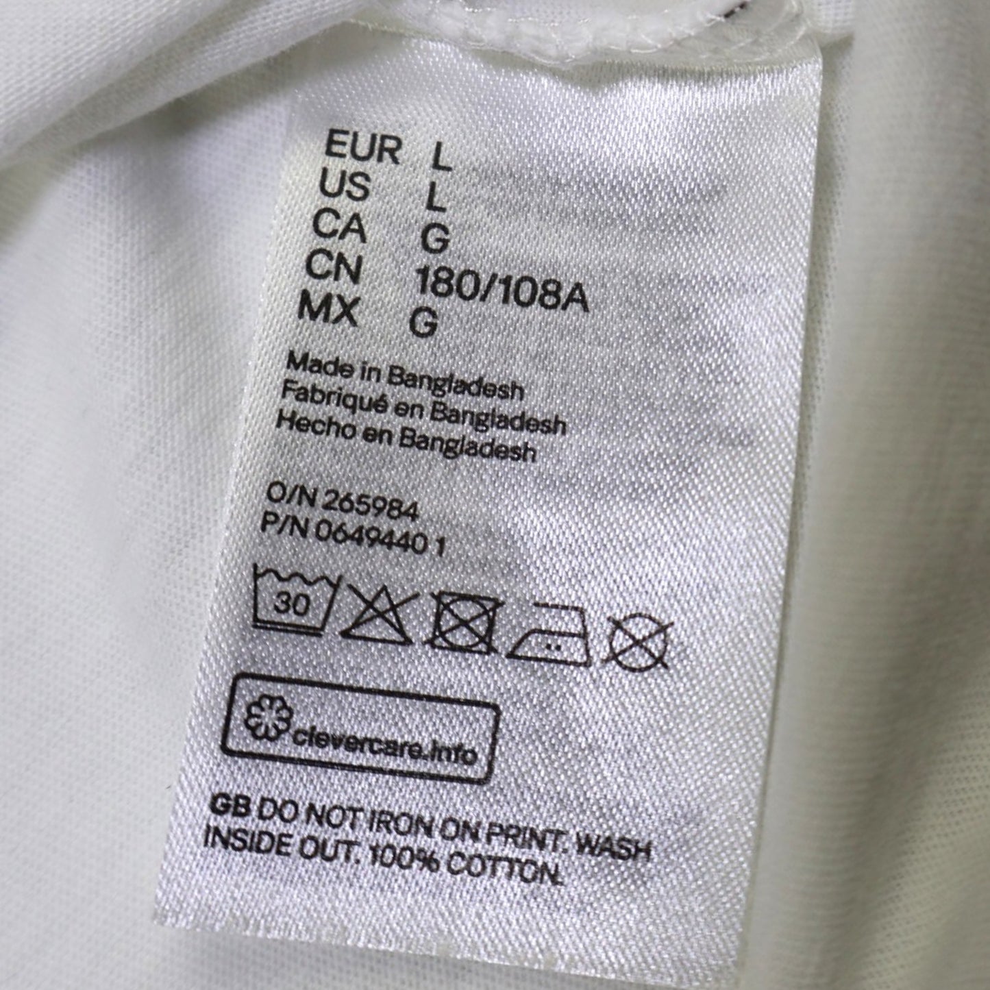 CAMISETA BLANCA CON ESTAMPADO DE PALMERAS | H&M | TALLA L