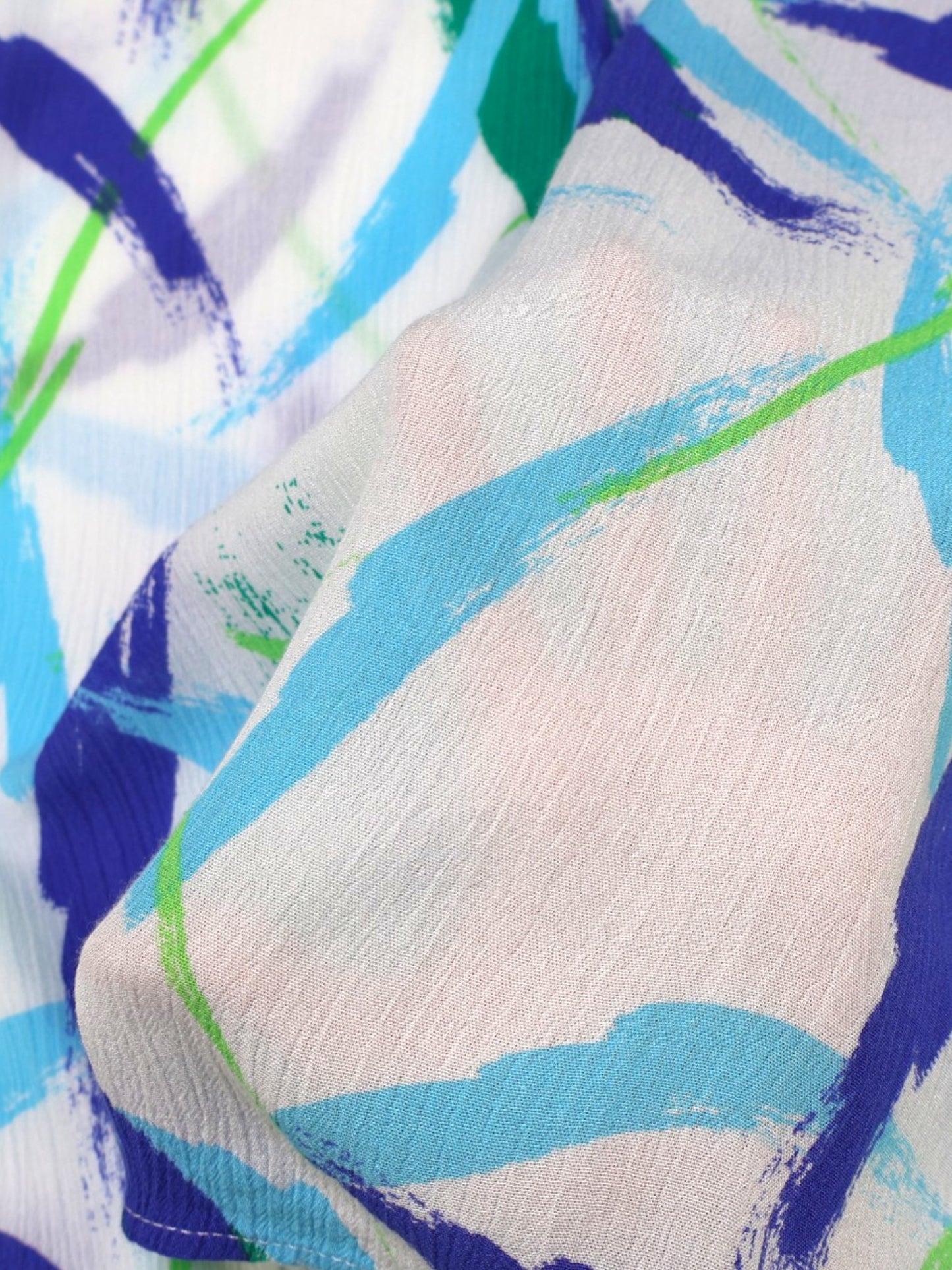 TOP SIN MANGAS BLANCO CON ESTAMPADO ABSTRACTO | TALLA XL