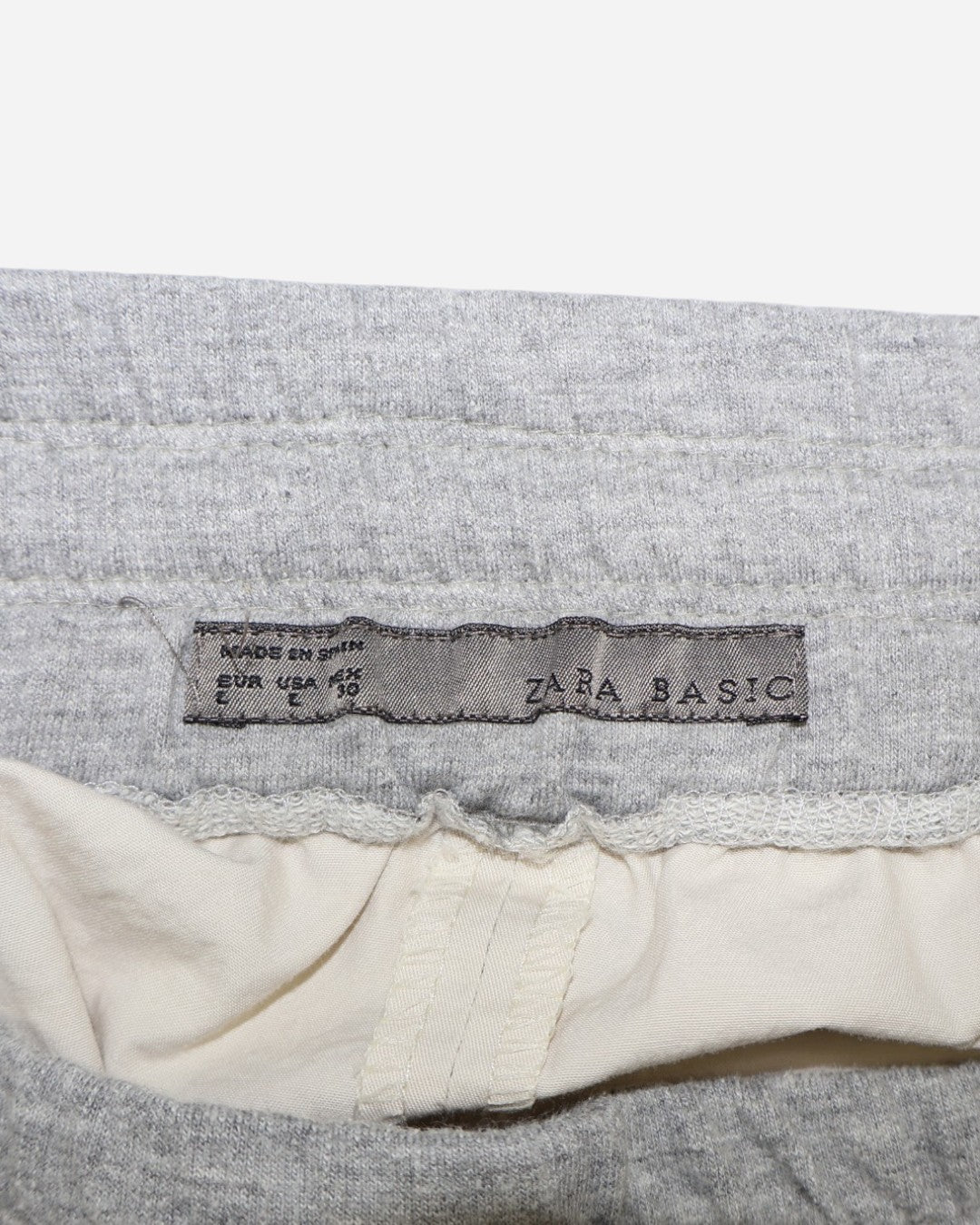 Falda corta beige con cintura elástica gris y cordón para mujer, marca Zara Basic, talla L, ropa de segunda mano en República Dominicana