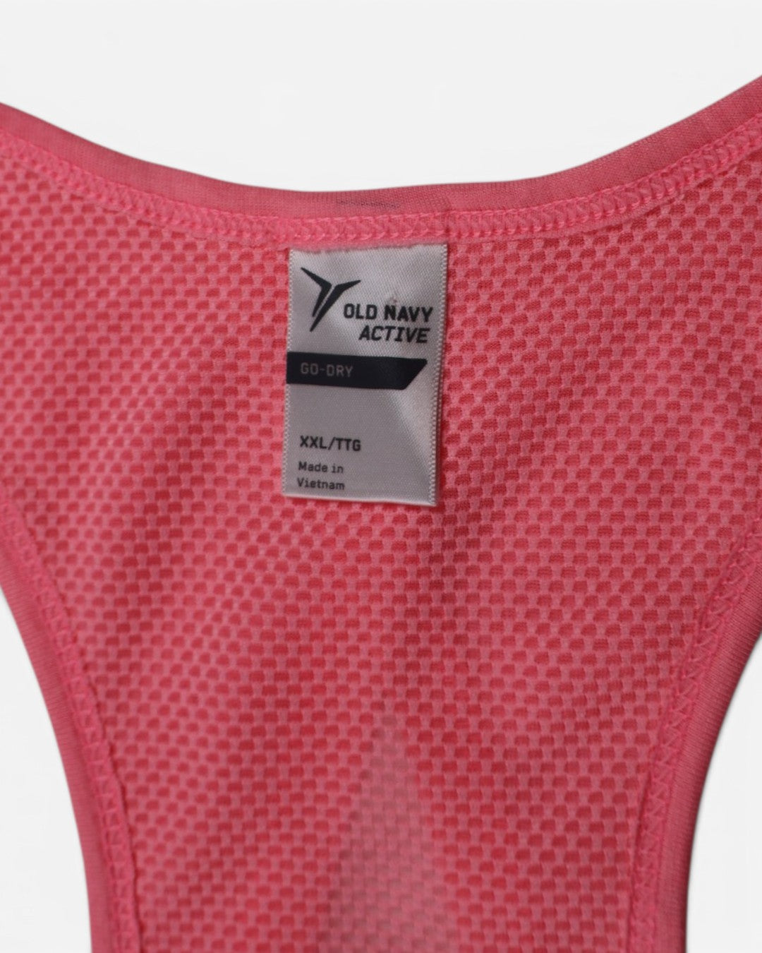 Etiqueta Old Navy Active talla XXL en top deportivo coral