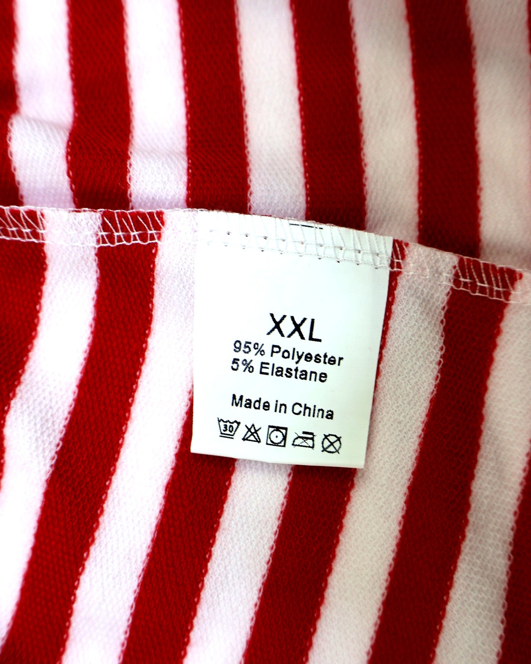 Etiqueta talla XXL 95% poliéster y 5% elastano de shorts de rayas, ropa de segunda mano en RD