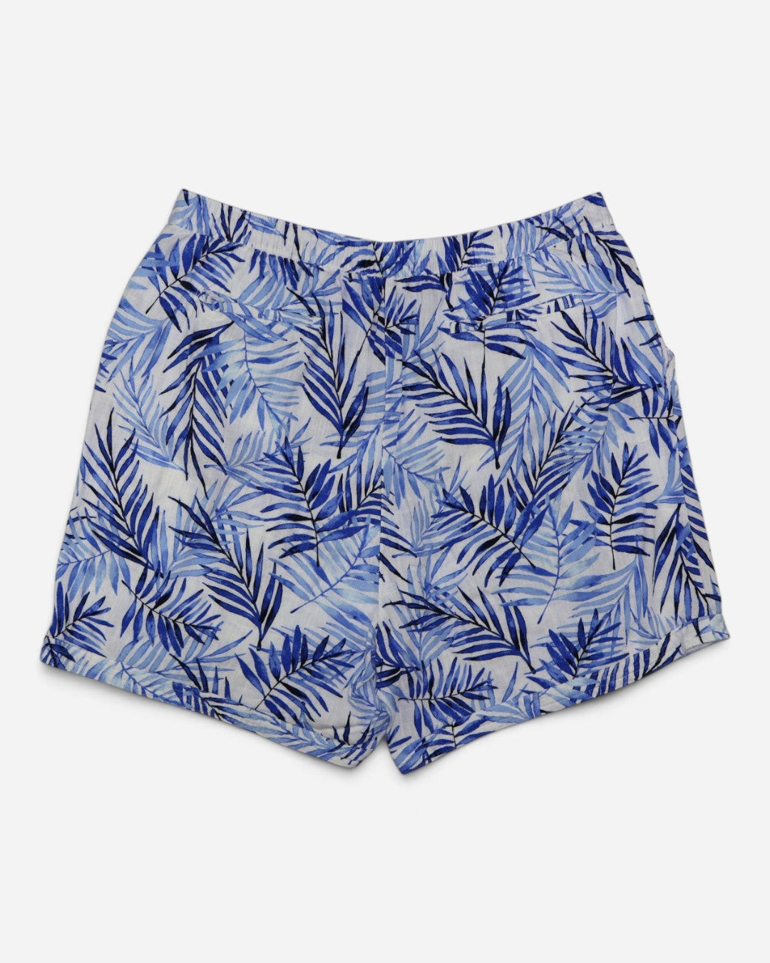 Parte trasera de Shorts para mujer talla XL con estampado tropical de hojas azules sobre fondo blanco.