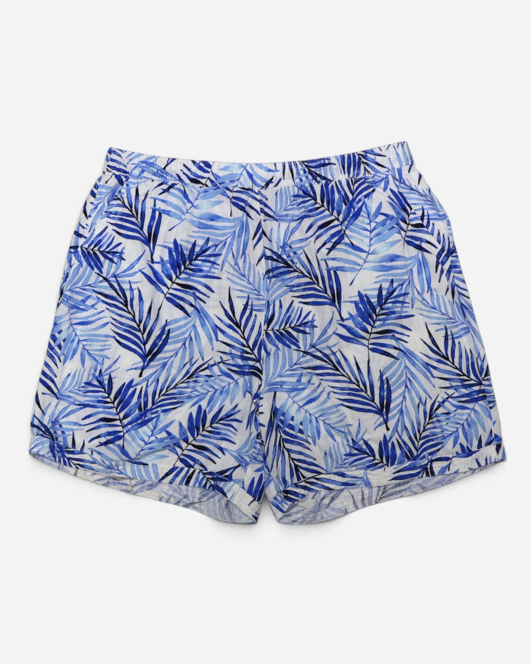 Shorts para mujer talla XL con estampado tropical de hojas azules sobre fondo blanco.