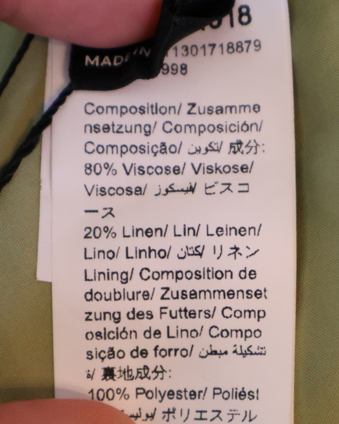 Composición 80% viscosa y 20% lino de falda verde talla M