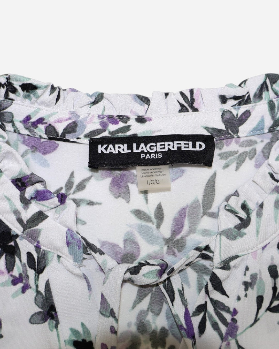 Cuello con volante y etiqueta Karl Lagerfeld Paris de blusa floral talla L