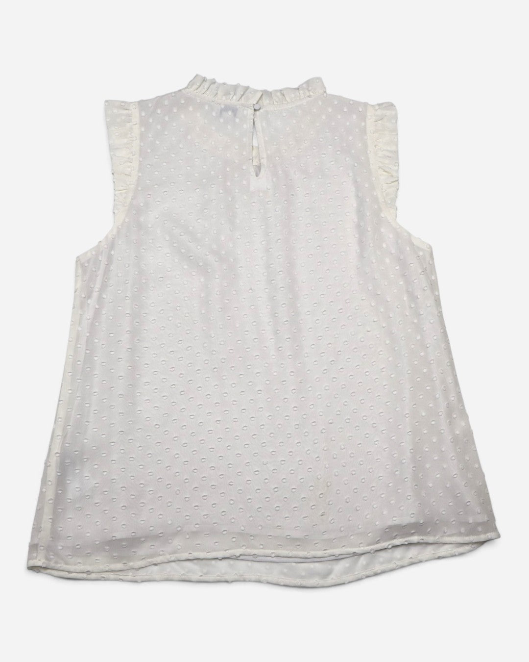 Espalda de blusa crema de puntos con volantes, ropa de segunda mano en RD