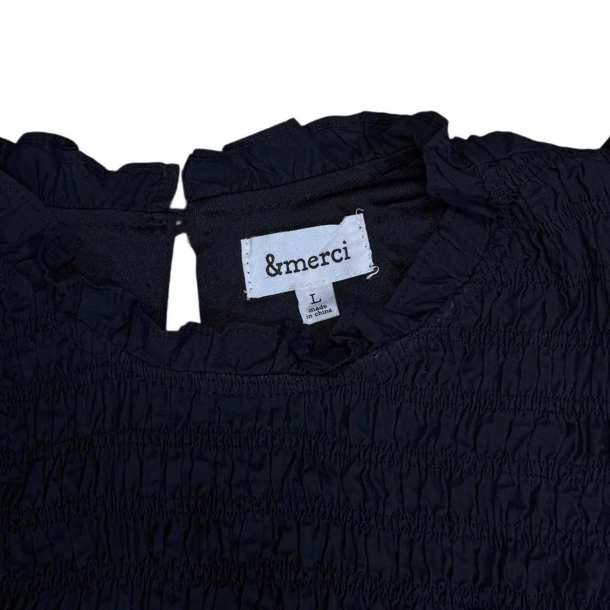 VESTIDO NEGRO CON VOLANTES | &MERCI | L